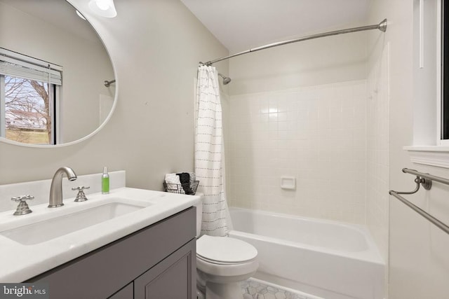 full bathroom with vanity, shower / bath combo with shower curtain, and toilet