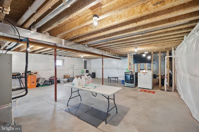 basement featuring washer and clothes dryer