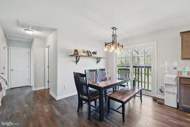 bathroom with visible vents, vanity, wood finished floors, toilet, and shower / bath combo