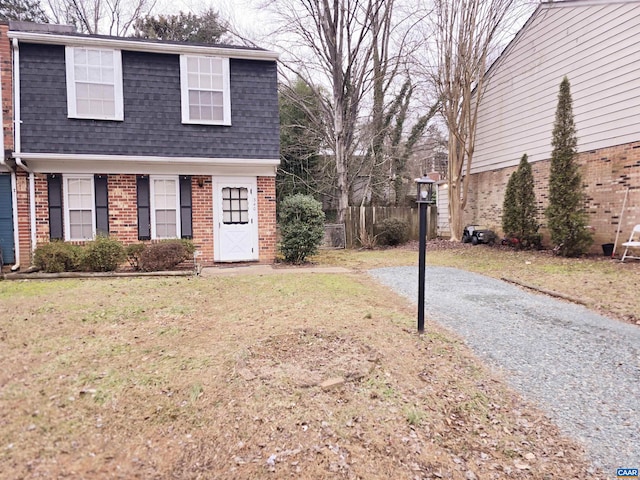 view of front of home with a front lawn