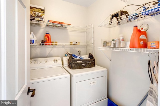 laundry area with laundry area and washing machine and dryer