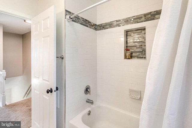 bathroom with shower / bath combination with curtain