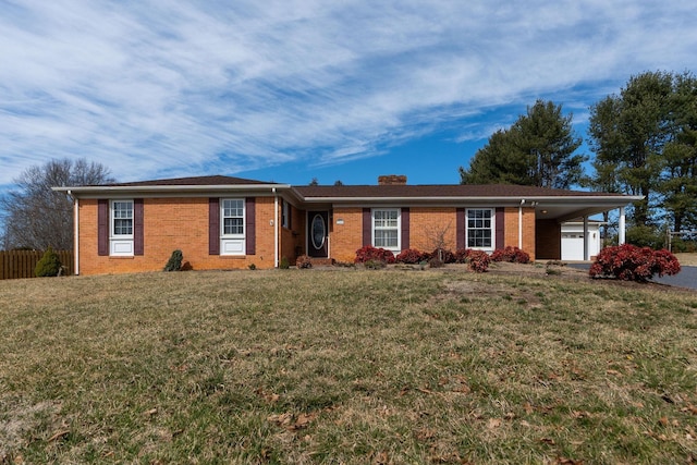 single story home featuring a carport, brick siding, and a front lawn