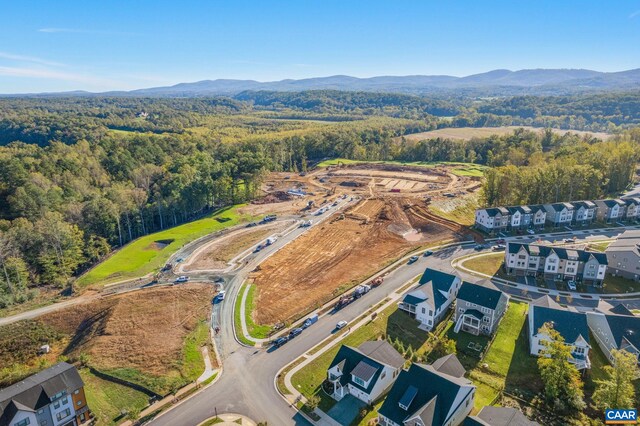 view of property's community featuring a yard