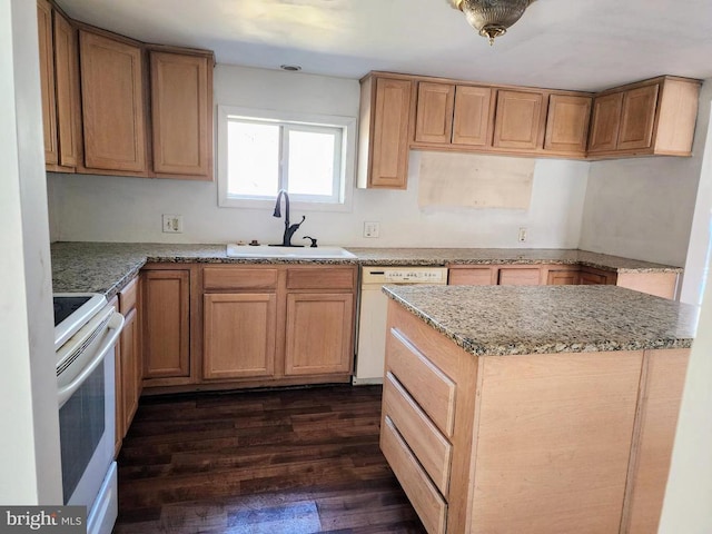 kitchen with white appliances, light stone countertops, dark wood-style flooring, and a sink