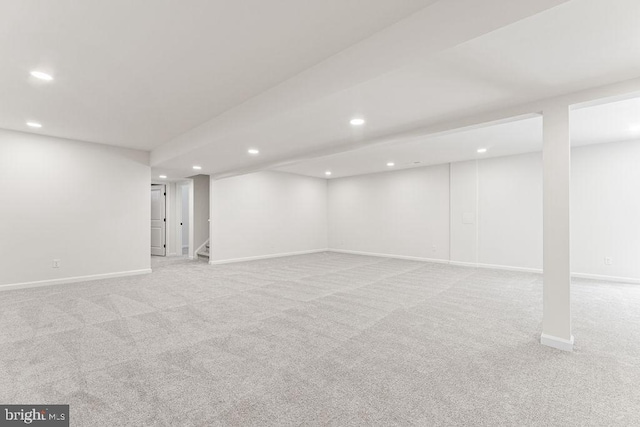 basement with light colored carpet