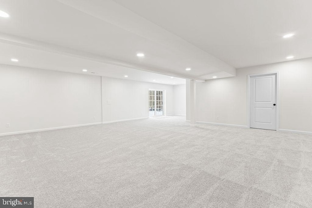 basement with light carpet