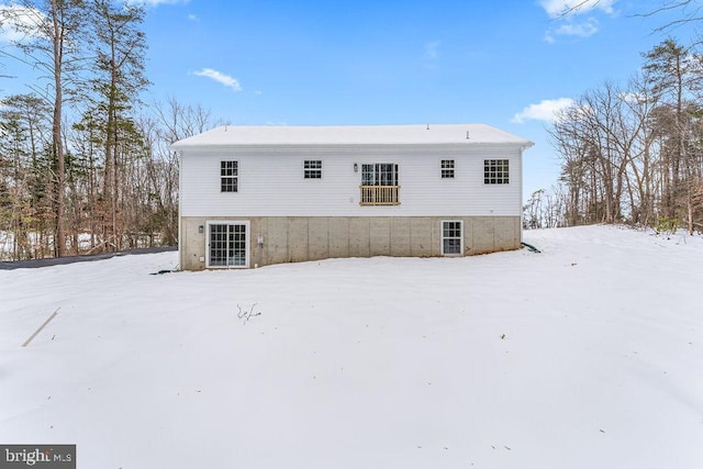 view of snow covered house