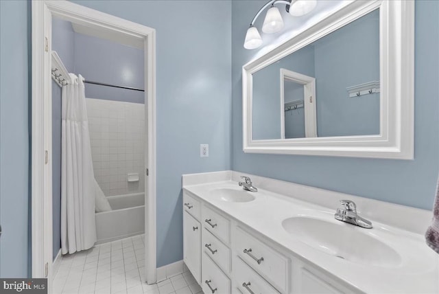 full bath featuring tile patterned flooring, shower / bath combo, a sink, and double vanity