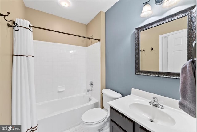 bathroom featuring shower / bath combination with curtain, vanity, and toilet