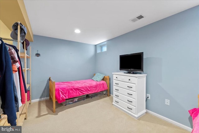 carpeted bedroom featuring recessed lighting, visible vents, and baseboards