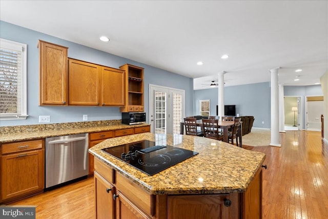 kitchen with brown cabinetry, black electric stovetop, stainless steel dishwasher, and ornate columns