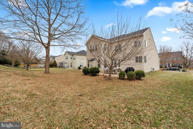 view of property exterior featuring a yard