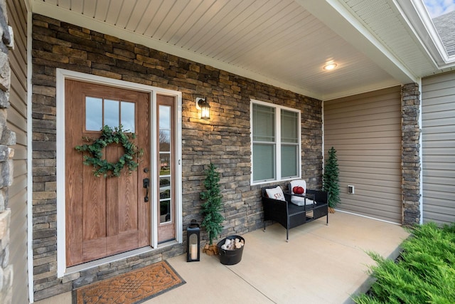 entrance to property with covered porch