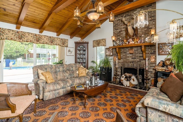 living room with vaulted ceiling with beams, an inviting chandelier, wood ceiling, and a fireplace