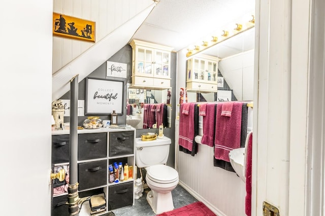 bathroom featuring toilet
