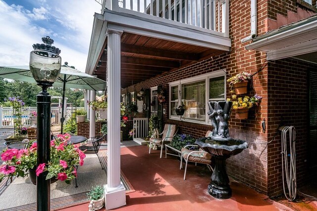 view of patio / terrace featuring a balcony
