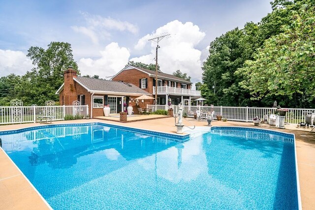 view of pool with a patio