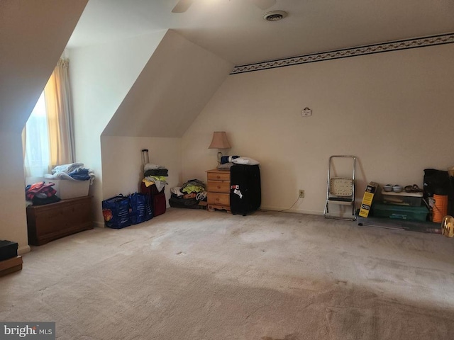 bonus room featuring visible vents, a ceiling fan, lofted ceiling, and carpet floors