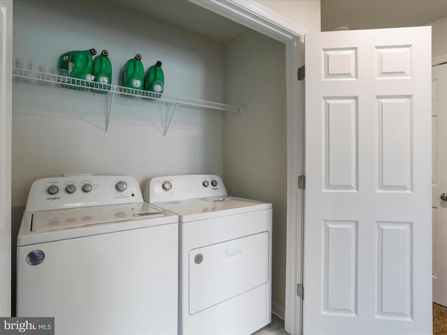 laundry area featuring washer and clothes dryer