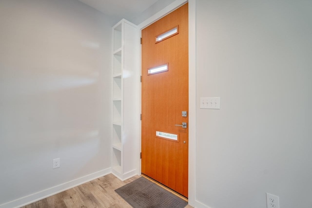 entryway with light hardwood / wood-style flooring