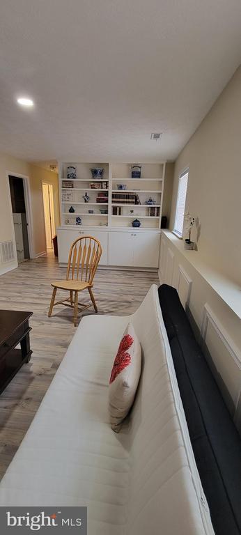 living room featuring light wood-type flooring