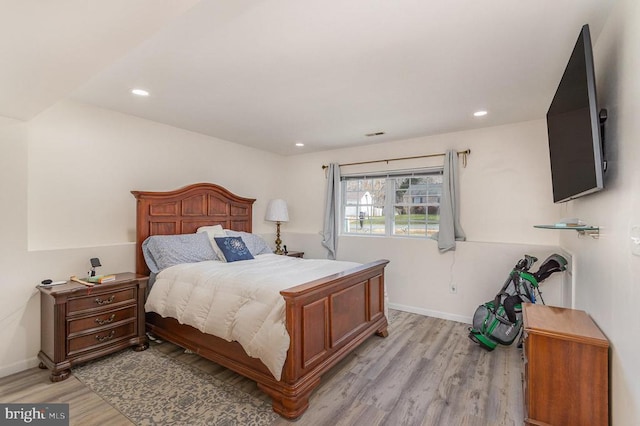 bedroom with light hardwood / wood-style floors