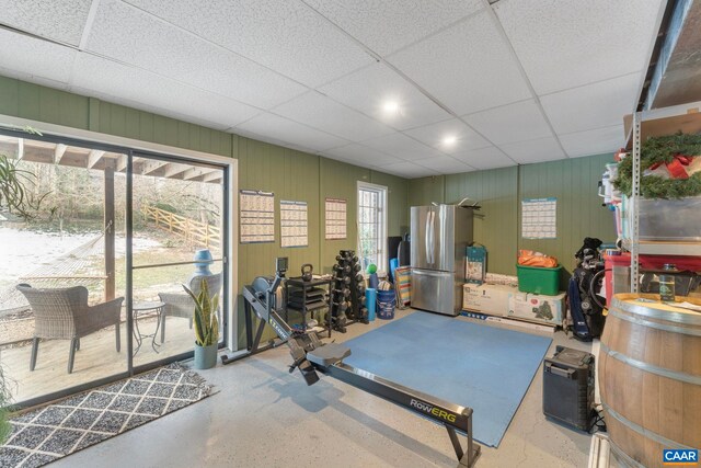 exercise area featuring a paneled ceiling