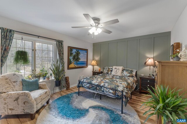 bedroom featuring ceiling fan and light hardwood / wood-style floors