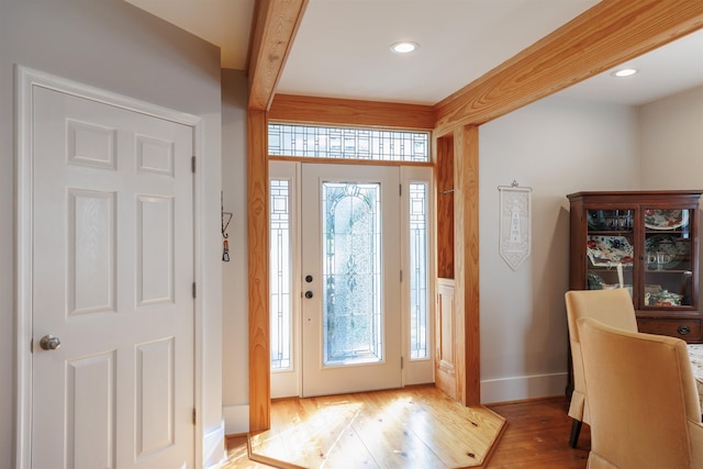 entrance foyer with light hardwood / wood-style flooring