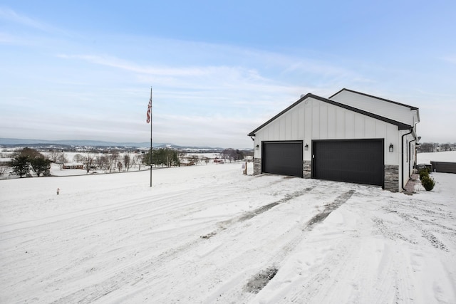 view of snow covered garage