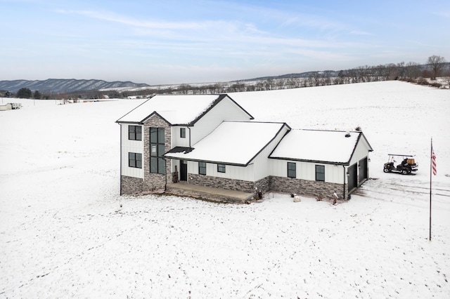 exterior space featuring a mountain view