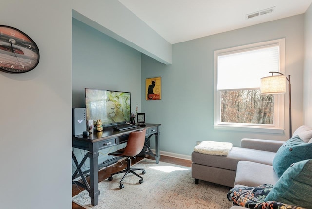 home office featuring visible vents and baseboards