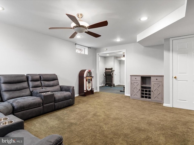 carpeted living area featuring recessed lighting, baseboards, and ceiling fan