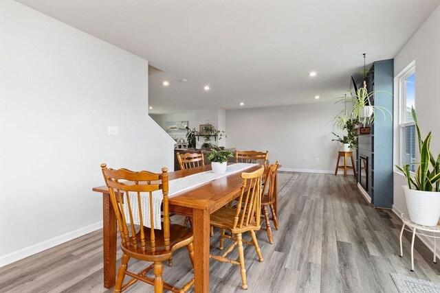 dining room with hardwood / wood-style floors