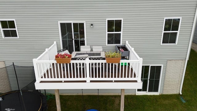 wooden deck featuring an outdoor hangout area