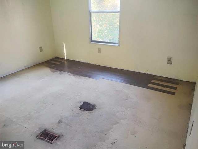 empty room featuring concrete floors