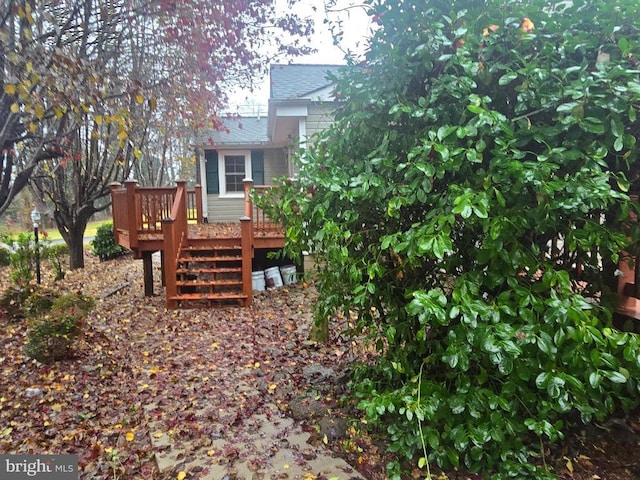 view of yard with a deck