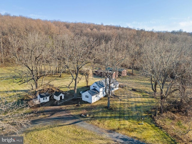 birds eye view of property featuring a rural view