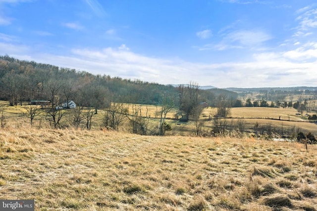 property view of mountains with a rural view