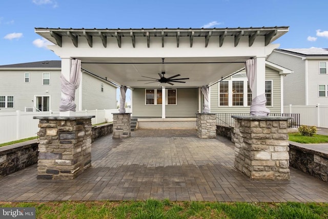 view of patio / terrace featuring a fenced backyard and a ceiling fan