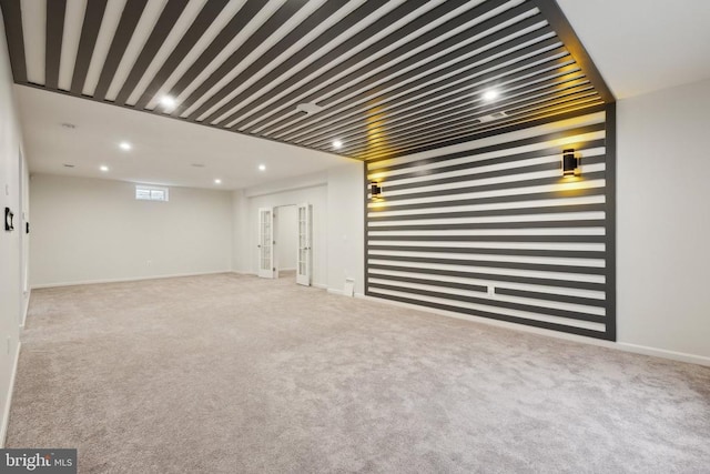 below grade area with baseboards, recessed lighting, and carpet flooring