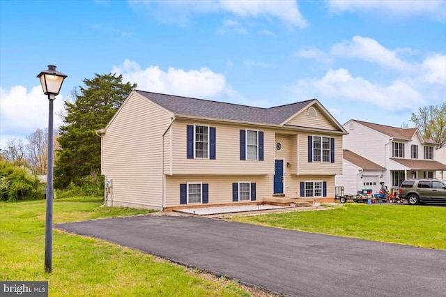 split foyer home with a front yard