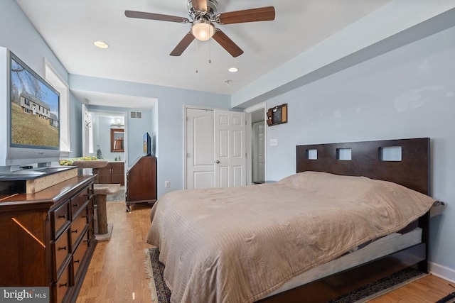 bedroom featuring baseboards, visible vents, recessed lighting, ceiling fan, and light wood-style floors