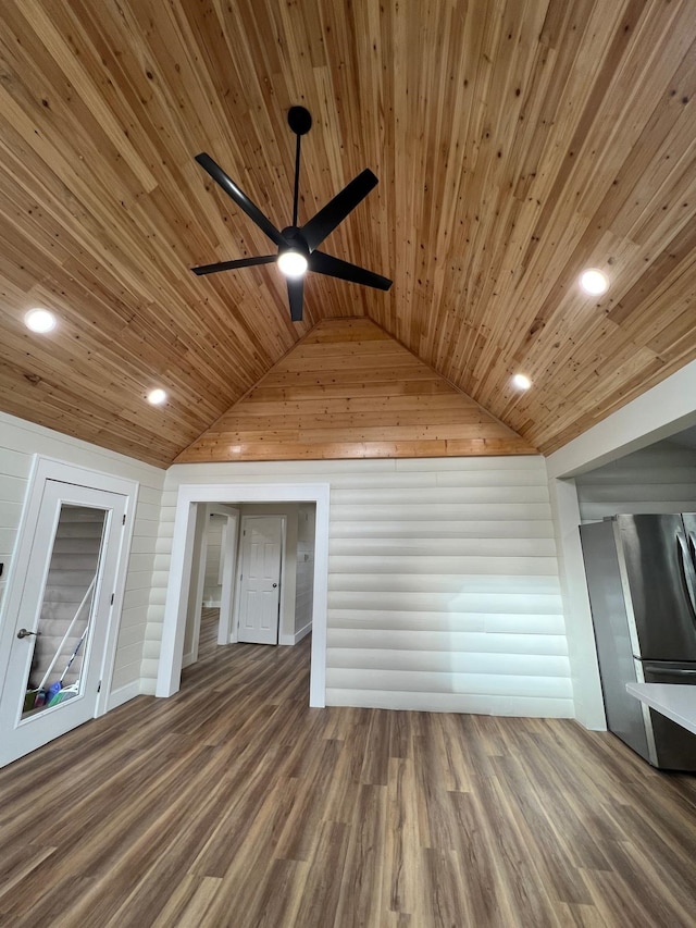 unfurnished living room with lofted ceiling, hardwood / wood-style floors, wood ceiling, and ceiling fan