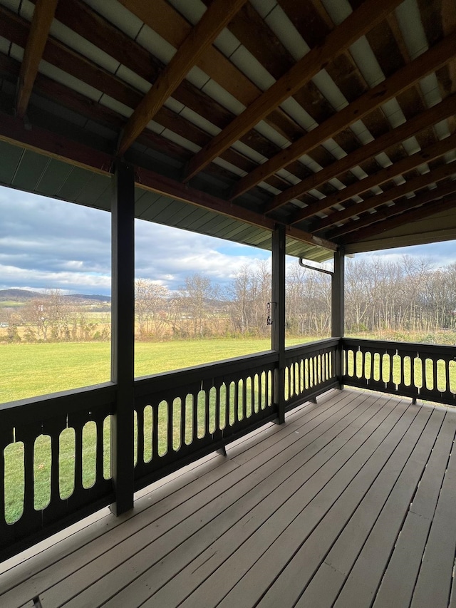 deck featuring a lawn