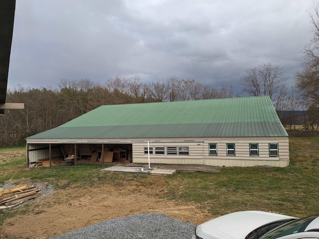 exterior space featuring a front lawn