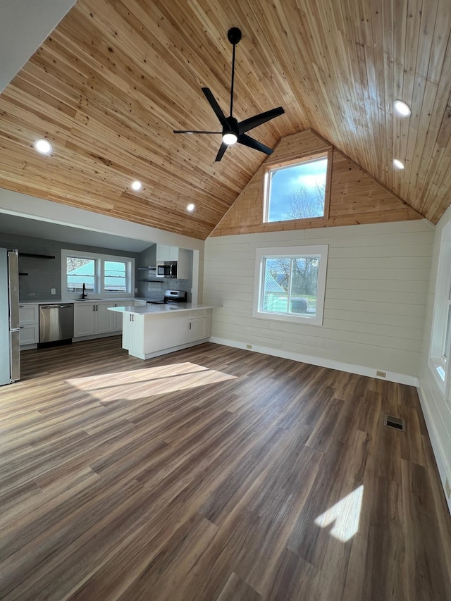 unfurnished living room with sink, high vaulted ceiling, wooden ceiling, dark hardwood / wood-style floors, and ceiling fan