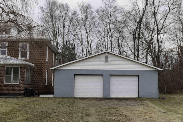 garage with a lawn