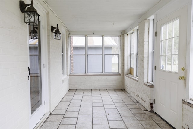 view of unfurnished sunroom